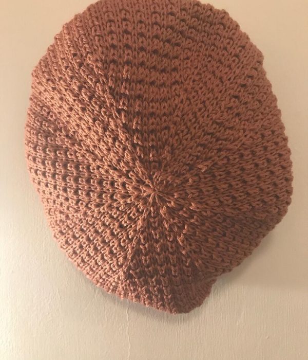 Knitted beret in coral £35