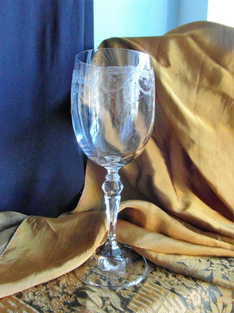 New white wine glasses with etched Georgian motif